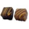 square chocolate pieces filled with peanut butter meltaway center and striped with peanut butter chocolate