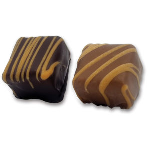 square chocolate pieces filled with peanut butter meltaway center and striped with peanut butter chocolate