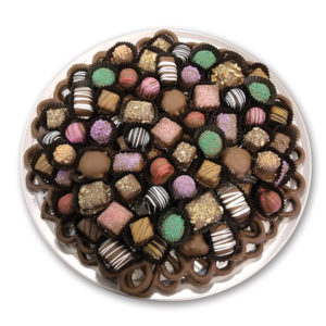 candy tray with assorted chocolates and pretzels