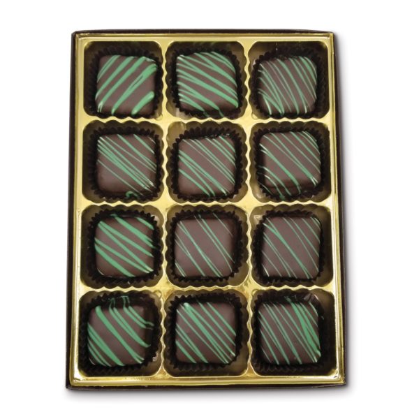 square chocolate pieces filled with smooth mint chocolate, striped with green chocolate