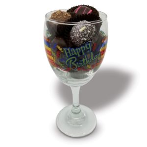 Birthday glass filled with truffles
