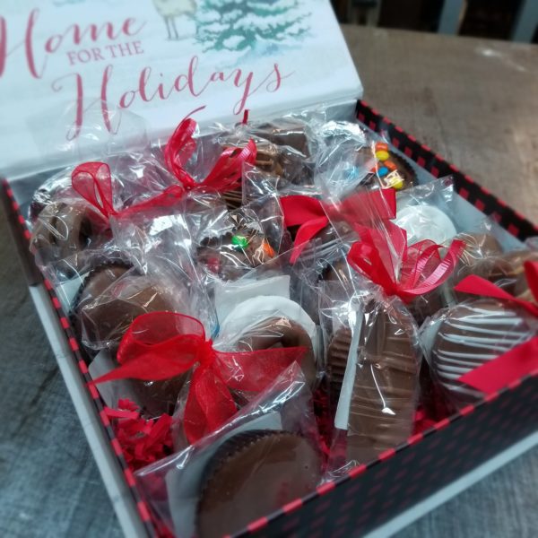 Covid friendly holiday treat box filled with individually wrapped chocolates