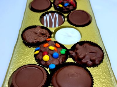 a sampler treat box with 12 individual chocolate treats