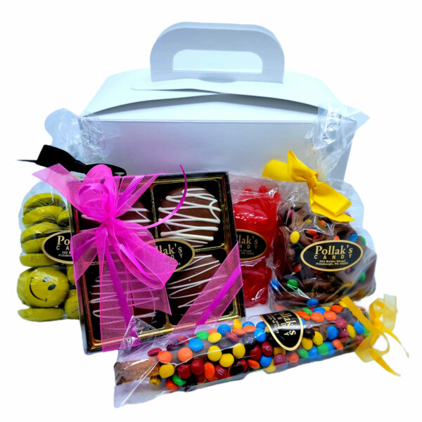 care package box filled with candy treats