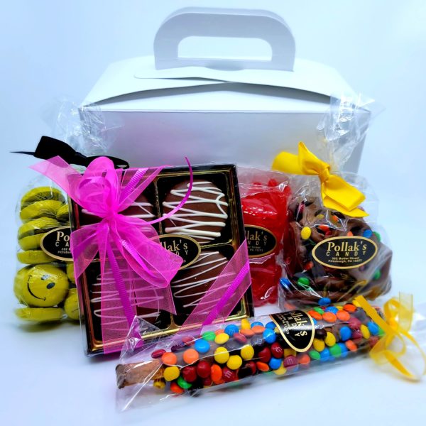 A candy care package with a candy assortment of chocolates and gummis