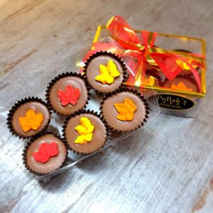 Fall candy on top of milk chocolate cup