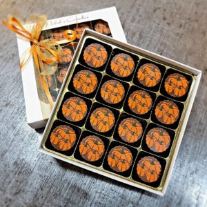 Chocolate pumpkin flavored truffle with pumpkins on top