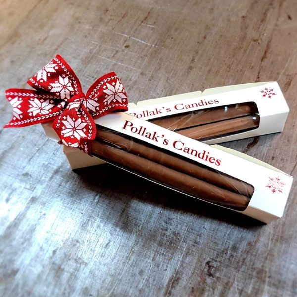 a gift box with chocolate covered pretzel rods