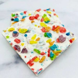 white chocolate loaded with colorful fruity pebbles cereal pieces