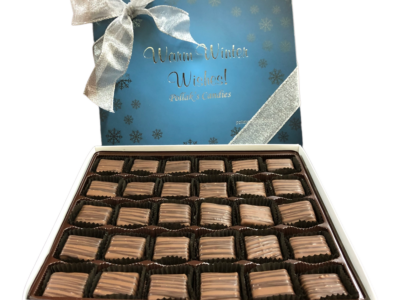 blue box with silver snowflakes filled with chocolate meltaways